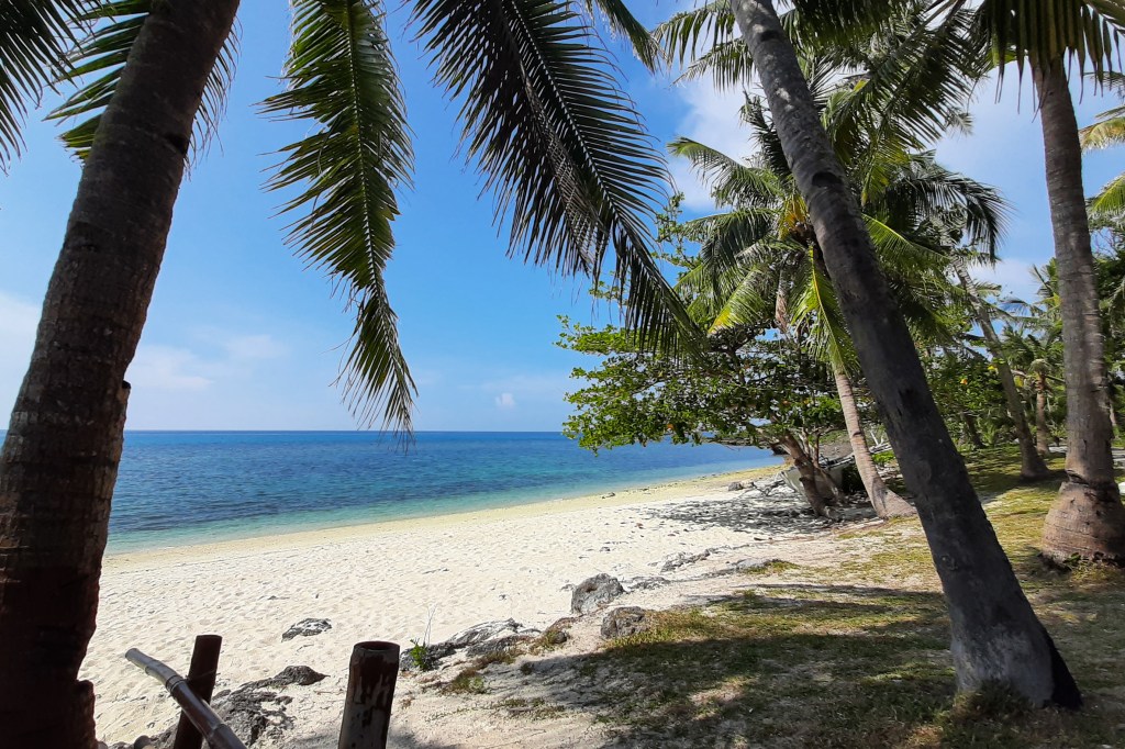Quiet beach beside the cliff jumping site at Virgin Island, Bantayan Island