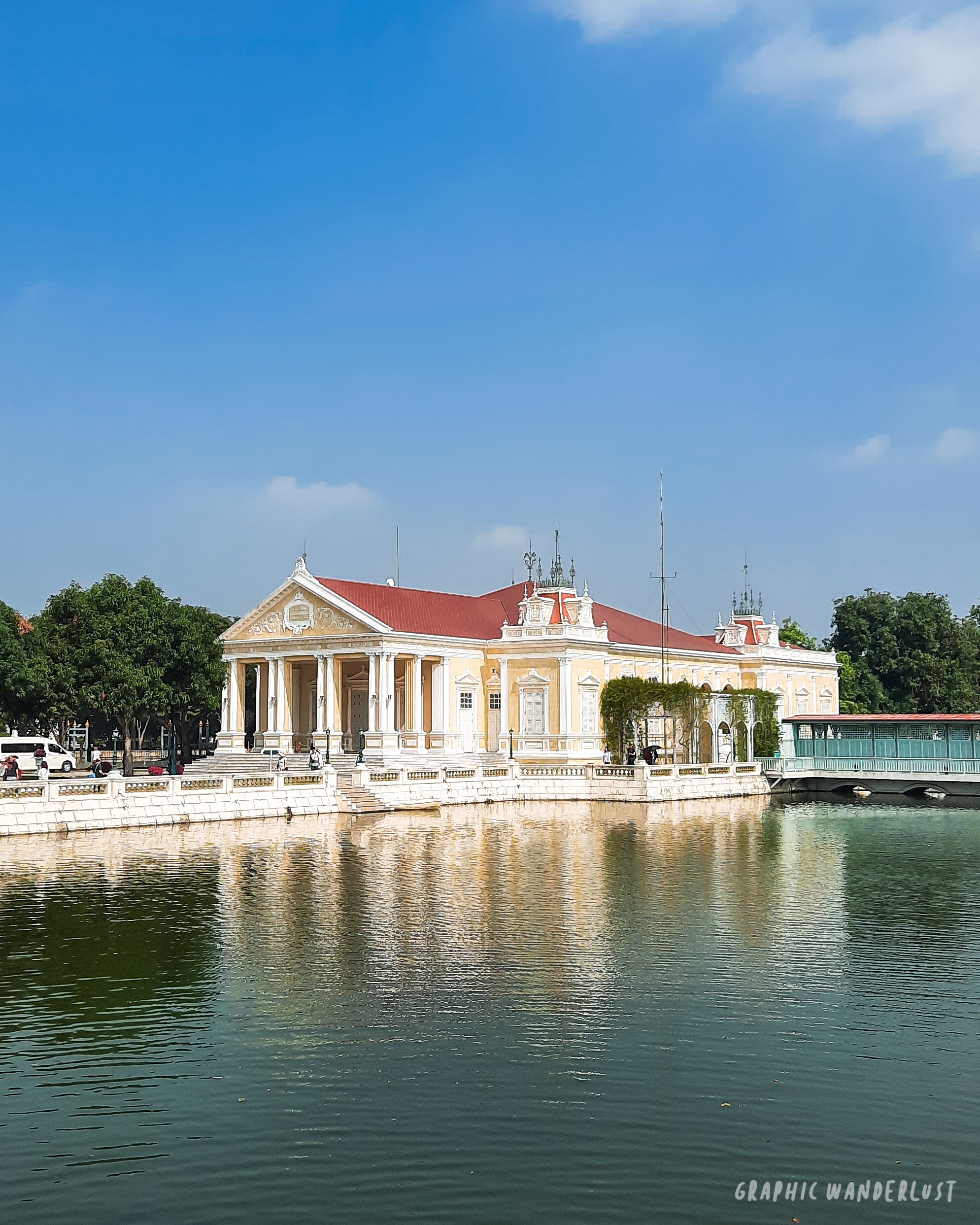 Neoclassical Thai royal building beside a man-made lake in Bang Pa-in Palace