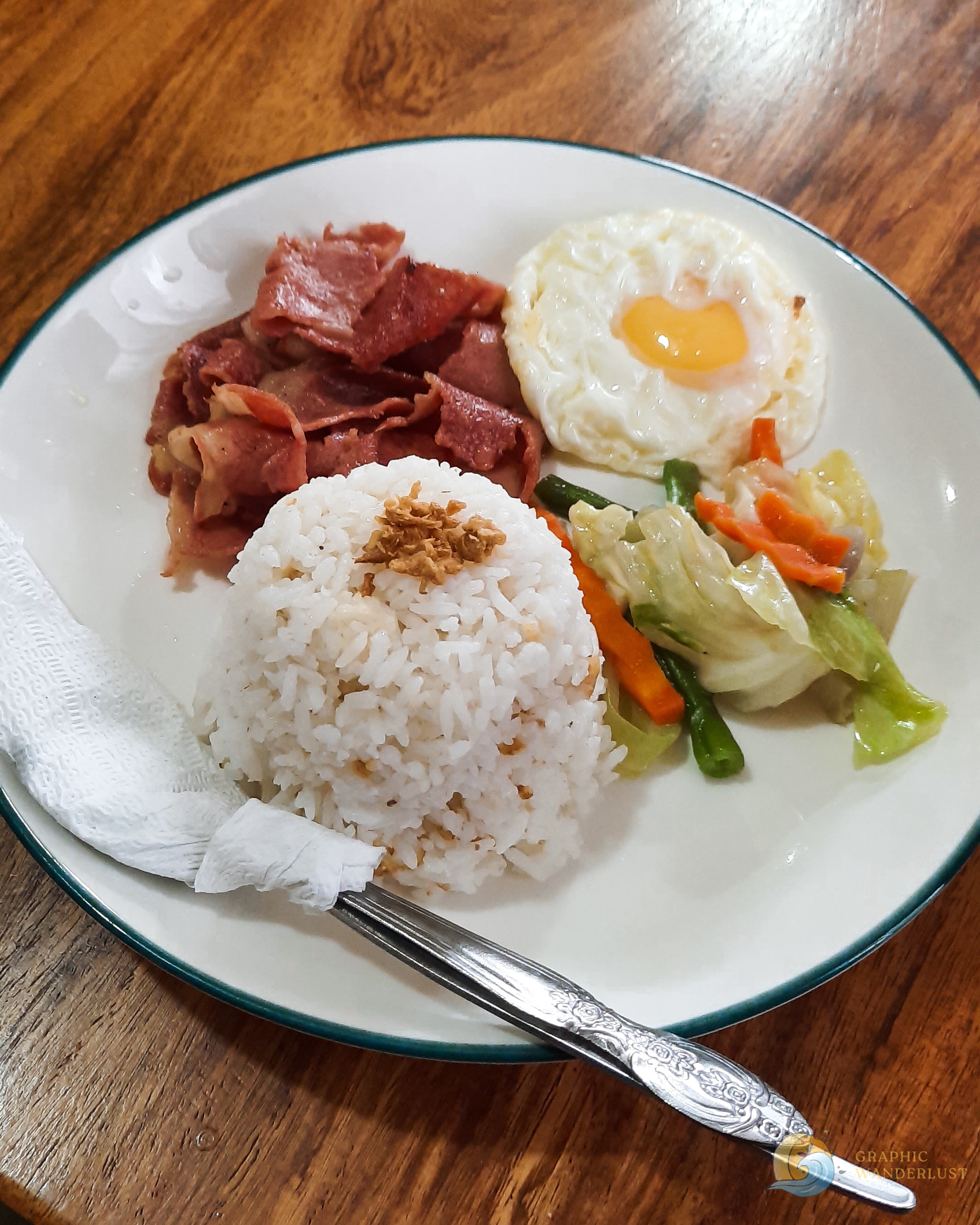 A serving of bacon, fried rice and egg at a restaurant in Banaue Rice Terraces