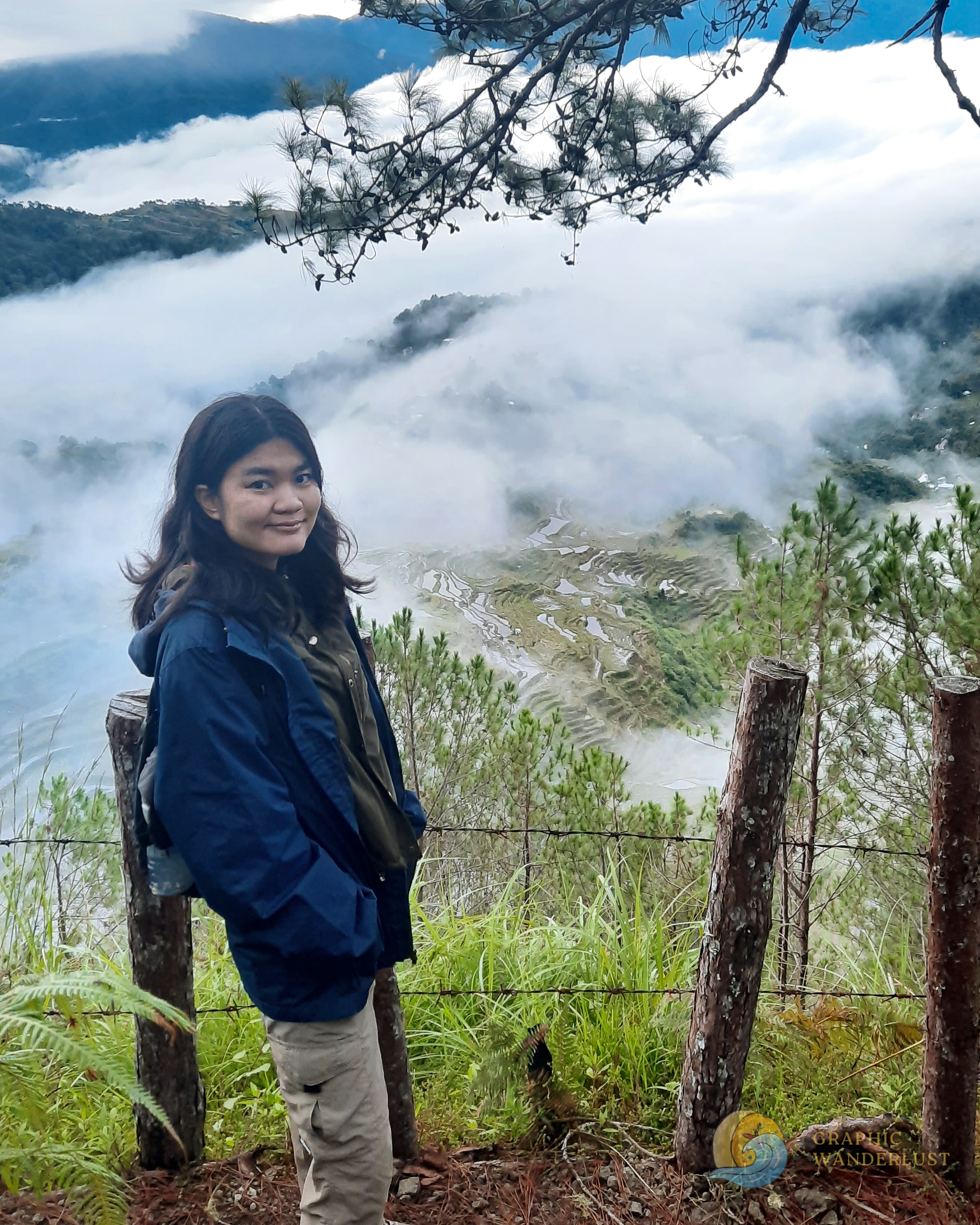 Girl at the summit of Mt. Kupapey with Maligcong Rice Terraces at the background