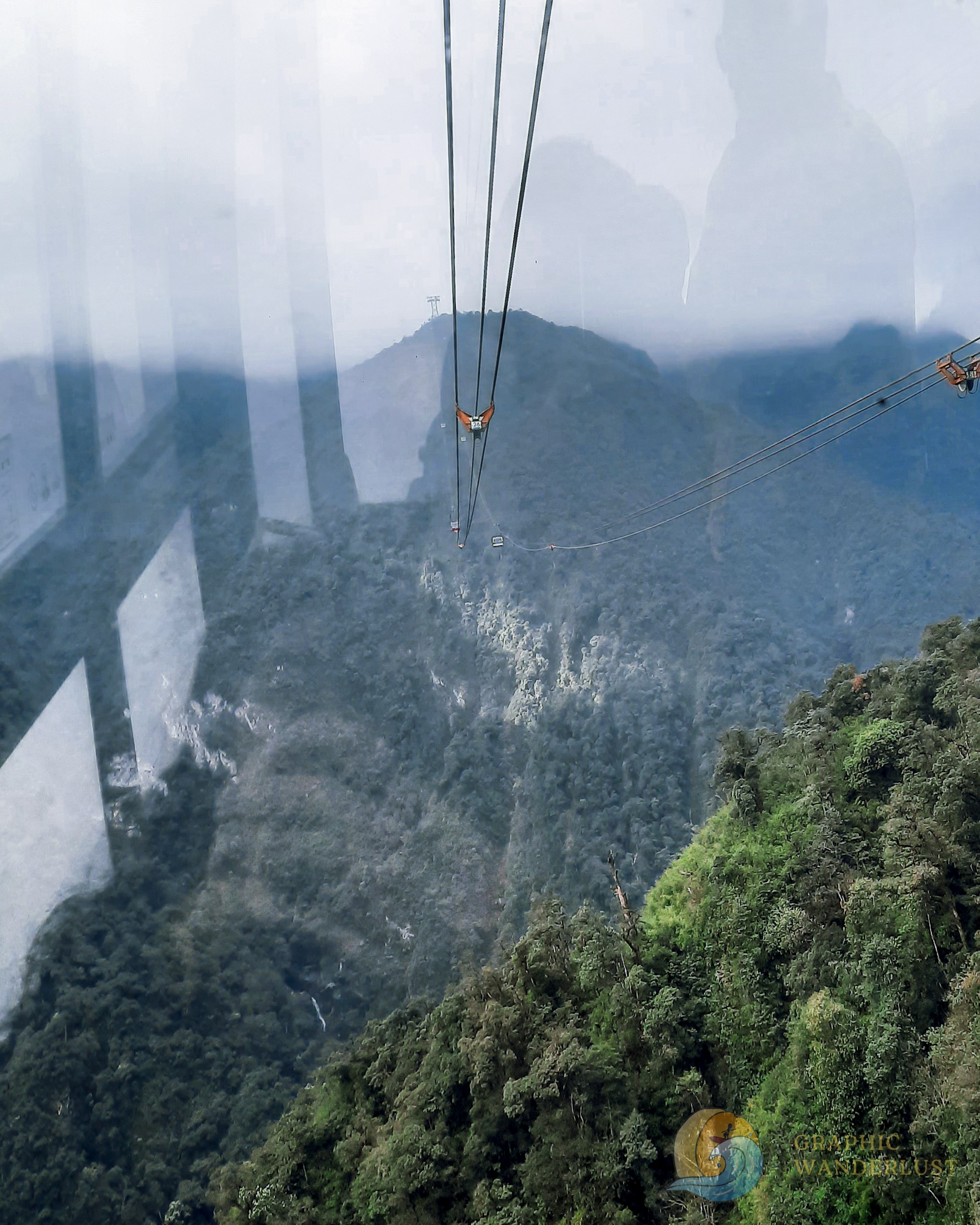 Lush mountain peaks as seen from a cable car