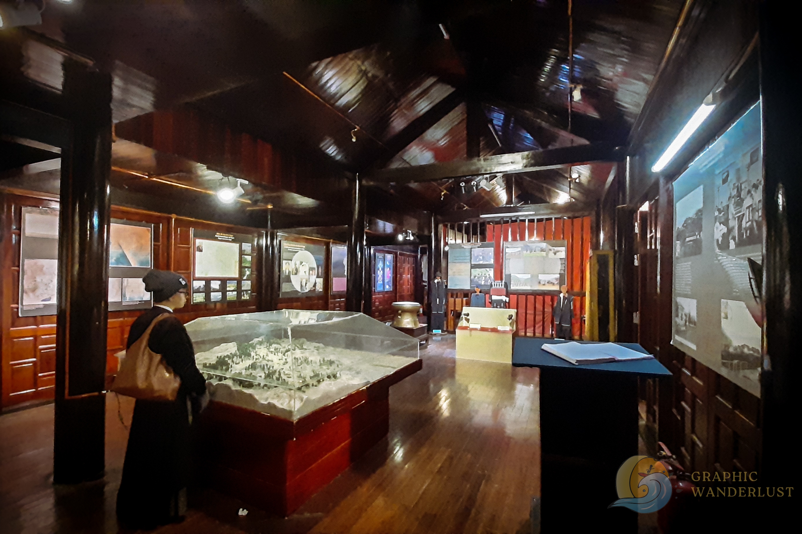 Interior view of a wooden museum showcasing its gallery