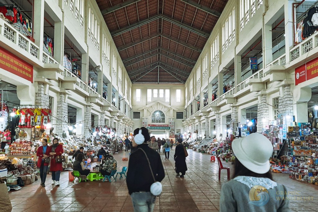 Interior of a local market with vendors and shoppers found