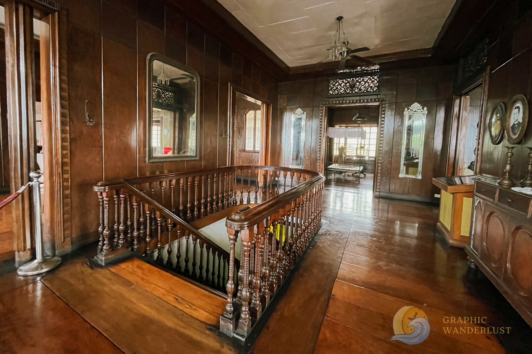 The antesala with a view of the grand staircase leading to it as seen inside a Spanish colonial house in Taal, Batangas.